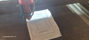 Picture of a lasercut in progress.